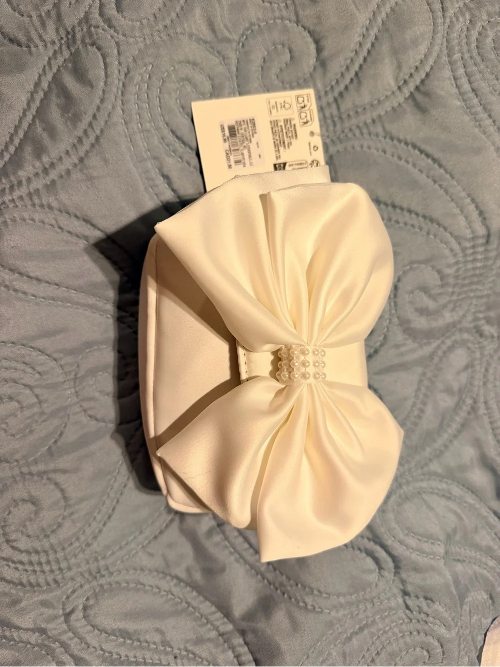 Ivory Bow Clutch with Pearl Accent